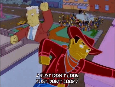 GIF from The Simpsons scene
    where all the giant mascots are ruining town and Paul Anka sings 'just
    don't look'
